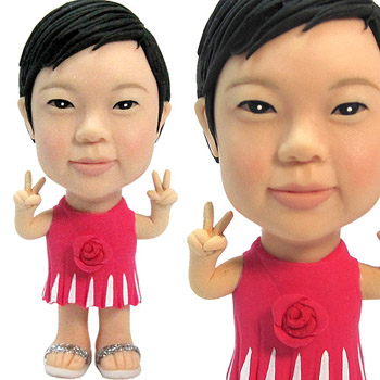 紅色洋裝小女孩公仔